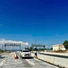 Thu phí tự động không dừng trên tuyến cao tốc Vĩnh Hảo-Phan Thiết. (Ảnh: PV/Vietnam+)