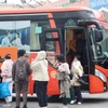 Người dân trở về Thủ đô vào ngày cuối của kỳ nghỉ Tết Nguyên đán Ất Tỵ trên các chuyến xe khách. (Ảnh: Việt Hùng/Vietnam+)