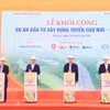 Các đại biểu ấn nút khởi công Dự án đường cao tốc Chợ Mới-Bắc Kạn. (Ảnh: Việt Hùng/Vietnam+)