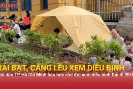 Người dân TP Hồ Chí Minh dựng lều, trải bạt sẵn sàng trắng đêm chờ xem diễu binh