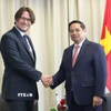 Thủ tướng Phạm Minh Chính tiếp ông Jevgeni Kabanov, Chủ tịch Tập đoàn Bolt - tập đoàn công nghệ chuyên về di chuyển và giao hàng tiêu biểu của Estonia. (Ảnh: Dương Giang/TTXVN)