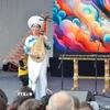 Nghệ sỹ của Trung tâm Văn hóa Việt Nam tại Pháp biểu diễn tại Korean Expo 2025. (Ảnh: Hữu Chiến/TTXVN)