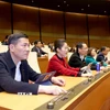 Đại biểu Quốc hội tỉnh Nghệ An biểu quyết thông qua dự thảo Nghị quyết của Quốc hội về việc bầu Phó Chủ tịch Quốc hội khóa XV. (Ảnh: Phương Hoa/TTXVN)