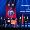 Bí thư Trung ương Đảng, Phó Chủ tịch nước Cộng hòa Xã hội Chủ nghĩa Việt Nam Võ Thị Ánh Xuân (áo dài đỏ) đại diện Đảng và Nhà nước trao tặng danh hiệu Anh hùng Lao động lần thứ hai cho tập thể Vinamilk (Ảnh: Minh Anh)