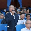 Cử tri phường Thanh Khê Ngô Nhật Anh phát biểu tại một hội nghị tiếp xúc cử tri. (Ảnh: Phương Hoa/TTXVN)
