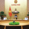 Thủ tướng Phạm Minh Chính chủ trì họp Chính phủ để đánh giá việc vận hành mô hình chính quyền địa phương 2 cấp.(Ảnh: Dương Giang/TTXVN)