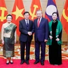 Tổng Bí thư Tô Lâm và Phu nhân với Tổng Bí thư, Chủ tịch nước Lào Thongloun Sisoulith và Phu nhân. (Ảnh: Thống Nhất/TTXVN)