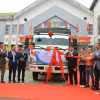 Kéo băng xuất khẩu lô hàng 35 tấn hạt Macca chính ngạch đầu tiên sang thị trường Hàn Quốc. (Nguồn: Cổng thông tin điện tử huyện Ea H’Leo)