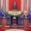 Chủ tịch nước Lương Cường và Tổng thống Nam Phi Matamela Cyril Ramaphosa gặp gỡ báo chí, thông báo về kết quả hội đàm giữa hai bên. (Ảnh: Lâm Khánh/TTXVN)