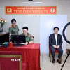Thu nhận ảnh khuôn mặt của người nước ngoài cư trú tại Việt Nam đến làm thủ tục cấp tài khoản định danh điện tử. (Ảnh: Phạm Kiên/TTXVN)