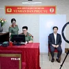 Thu nhận ảnh khuôn mặt của người nước ngoài cư trú tại Việt Nam đến làm thủ tục cấp tài khoản định danh điện tử. (Ảnh: Phạm Kiên/TTXVN)