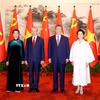 Tổng Bí thư, Chủ tịch nước Tô Lâm và Phu nhân cùng Tổng Bí thư, Chủ tịch nước Trung Quốc Tập Cận Bình và Phu nhân chụp ảnh chung. (Ảnh: Thống Nhất/TTXVN)