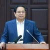 Thủ tướng Phạm Minh Chính làm việc với Ban Thường vụ Thành ủy Đà Nẵng về tình hình phát triển kinh tế-xã hội. (Ảnh: Dương Giang/TTXVN)