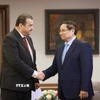 Thủ tướng Phạm Minh Chính tiếp ông Mohamed Arkab, Bộ trưởng Bộ Năng lượng Algeria. (Ảnh: Dương Giang/TTXVN)