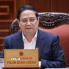 Thủ tướng Phạm Minh Chính chủ trì cuộc họp với các bộ, ngành để thảo luận các giải pháp điều hành kinh tế vĩ mô và ứng phó với thách thức trong khu vực và trên thế giới. (Ảnh: Dương Giang/TTXVN)