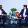 Thủ tướng Phạm Minh Chính gặp Phó Tổng thống Nam Phi Paul Mashatile. (Ảnh: Dương Giang/TTXVN)