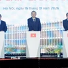Tổng Bí thư Tô Lâm, Thủ tướng Phạm Minh Chính và Trưởng Ban Nội chính Trung ương Phan Đình Trạc phát lệnh khởi công Nhà máy chế tạo Chip bán dẫn công nghệ cao. (Ảnh: Thống Nhất/TTXVN)