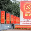 Pano, khẩu hiệu rực đỏ trên các tuyến phố Thủ đô chào mừng Đại hội đại biểu toàn quốc lần thứ XIV của Đảng. (Ảnh: Lê Đông/TTXVN)