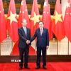 Chủ tịch Quốc hội Trần Thanh Mẫn đón Ủy viên trưởng Nhân đại toàn quốc Trung Quốc Triệu Lạc Tế. (Ảnh: Doãn Tấn/TTXVN)
