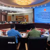 Cuộc làm việc với một số công dân có kiến nghị, khiếu nại liên quan đến việc thu hồi đất. (Ảnh: Minh Huệ/TTXVN)