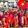 Diễu hành áo dài hữu nghị Malaysia – Việt Nam tại Kuala Lumpur. (Ảnh: Viên Luyến/TTXVN)