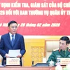Thường trực Ban Bí thư Trần Cẩm Tú chủ trì Công bố quyết định kiểm tra, giám sát Ban Thường vụ Quân uỷ Trung ương. (Ảnh: Phương Hoa/TTXVN)