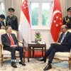 Tổng Bí thư Tô Lâm hội kiến Tổng thống Singapore Tharman Shanmugaratnam. (Ảnh: Thống Nhất/TTXVN)