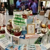 Các sản phẩm OCOP được trưng bày tại hội chợ. (Ảnh: Trần Việt/TTXVN)
