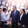 Tổng Bí thư Tô Lâm với các đại biểu. (Ảnh: Văn Điệp/TTXVN)