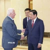 Trưởng Ban Nội chính Trung ương Phan Đình Trạc tiếp Tổng thư ký Tổ chức Giải phóng Palestine Azzam Najeb Mustafa AL Ahmad. (Ảnh: Phương Hoa/TTXVN)
