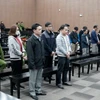 Các bị cáo tại phiên tòa ngày 27/2. (Ảnh: Kim Anh/TTXVN)