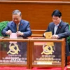 Tổng Bí thư Tô Lâm cùng các đồng chí lãnh đạo Đảng và Nhà nước bỏ phiếu bầu Ban Chấp hành Trung ương Đảng khóa XIV. (Ảnh: TTXVN)