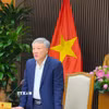 Phó Thủ tướng Thường trực Nguyễn Hòa Bình phát biểu tại cuộc họp. (Ảnh: Chu Thanh Vân/TTXVN)