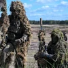 Binh sỹ thuộc Lữ đoàn Podkarpackie số 3 của Ba Lan tham gia cuộc tập trận ở Nowa Deba, ngày 18/9/2025. (Ảnh: PAP/TTXVN)