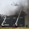 Hiện trường vụ cháy trung tâm logistics ở thành phố Icheon (Hàn Quốc) ngày 13/5/2025. (Ảnh: Yonhap/TTXVN)