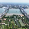 Cầu Mỹ Thuận 1 (trái) và Mỹ Thuận 2 bắc qua sông Tiền nối hai tỉnh Tiền Giang và Vĩnh Long. (Ảnh: Hồng Đạt/TTXVN)