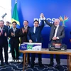 Thủ tướng Phạm Minh Chính và Tổng thống Brazil Lula da Silva tại lễ ký xuất khẩu hàng thương mại hai chiều giữa Việt Nam và Brazil. (Ảnh: Dương Giang/TTXVN)