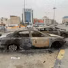 Phương tiện bị phá hủy do xung đột tại Tripoli (Libya) ngày 13/5/2025. (Ảnh: THX/TTXVN)