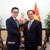 Phó Thủ tướng-Bộ trưởng Bộ Ngoại giao Bùi Thanh Sơn tiếp Quốc Vụ khanh Bộ Ngoại giao và Hợp tác Quốc tế Vương quốc Campuchia Ung Rachana. (Ảnh: An Đăng/TTXVN)