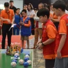 Học sinh tham gia giải đấu Robot FPT Schools mở rộng hồi tháng 12 năm ngoái. (Ảnh: Văn Dũng/TTXVN)