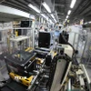 Dây chuyền lắp ráp máy giặt tự động hóa của Công ty LG Electronics Việt Nam Hải Phòng (100% vốn Hàn Quốc). (Ảnh: Vũ Sinh/TTXVN)