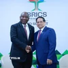 Thủ tướng Phạm Minh Chính hội kiến Tổng thống Nam Phi Cyril Ramaphosa. (Ảnh: Dương Giang/TTXVN)