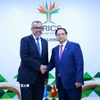 Thủ tướng Phạm Minh Chính gặp Tổng Giám đốc Tổ chức Y tế Thế giới (WHO) Tedros Adhanom Ghebreyesus. (Ảnh: Dương Giang/TTXVN)