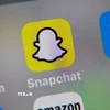 Biểu tượng Snapchat trên màn hình điện thoại. (Ảnh: AFP/TTXVN)
