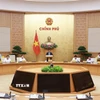Thủ tướng Phạm Minh Chính chủ trì họp đánh giá kết quả vận hành mô hình chính quyền địa phương hai cấp. (Ảnh: Dương Giang/TTXVN)