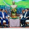 Thủ tướng Phạm Minh Chính hội kiến Tổng Bí thư, Chủ tịch nước Lào Thongloun Sisoulith. (Ảnh: Dương Giang/TTXVN)