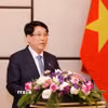 Chủ tịch nước Lương Cường phát biểu tại buổi gặp cộng đồng người Việt Nam tại Lào. (Ảnh: Lâm Khánh/TTXVN)