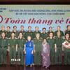 Các đại biểu dự chương trình "50 năm toàn thắng về ta." (Ảnh: Xuân Khu/TTXVN)