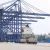 Hoạt động xuất nhập khẩu tại cảng Dương Phố, Hải Nam (Trung Quốc). (Ảnh: Công Tuyên/TTXVN)