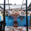 Một căn nhà của người dân phường Hiệp Thành, tỉnh Cà Mau, bị tốc mái sau khi dông lốc đi qua. (Ảnh: TTXVN phát)